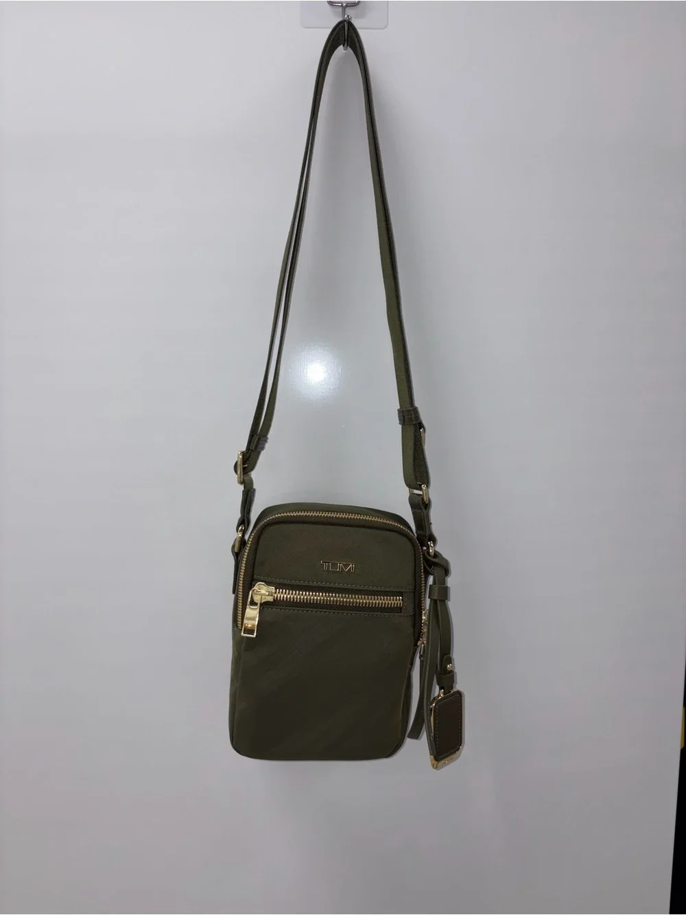 Tumi VOYAGER Olive Green Compact Crossbody with Gold Hardware
